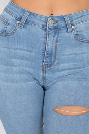 Ripped High Rise Ankle Jean